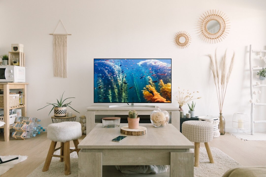 family gathered around television